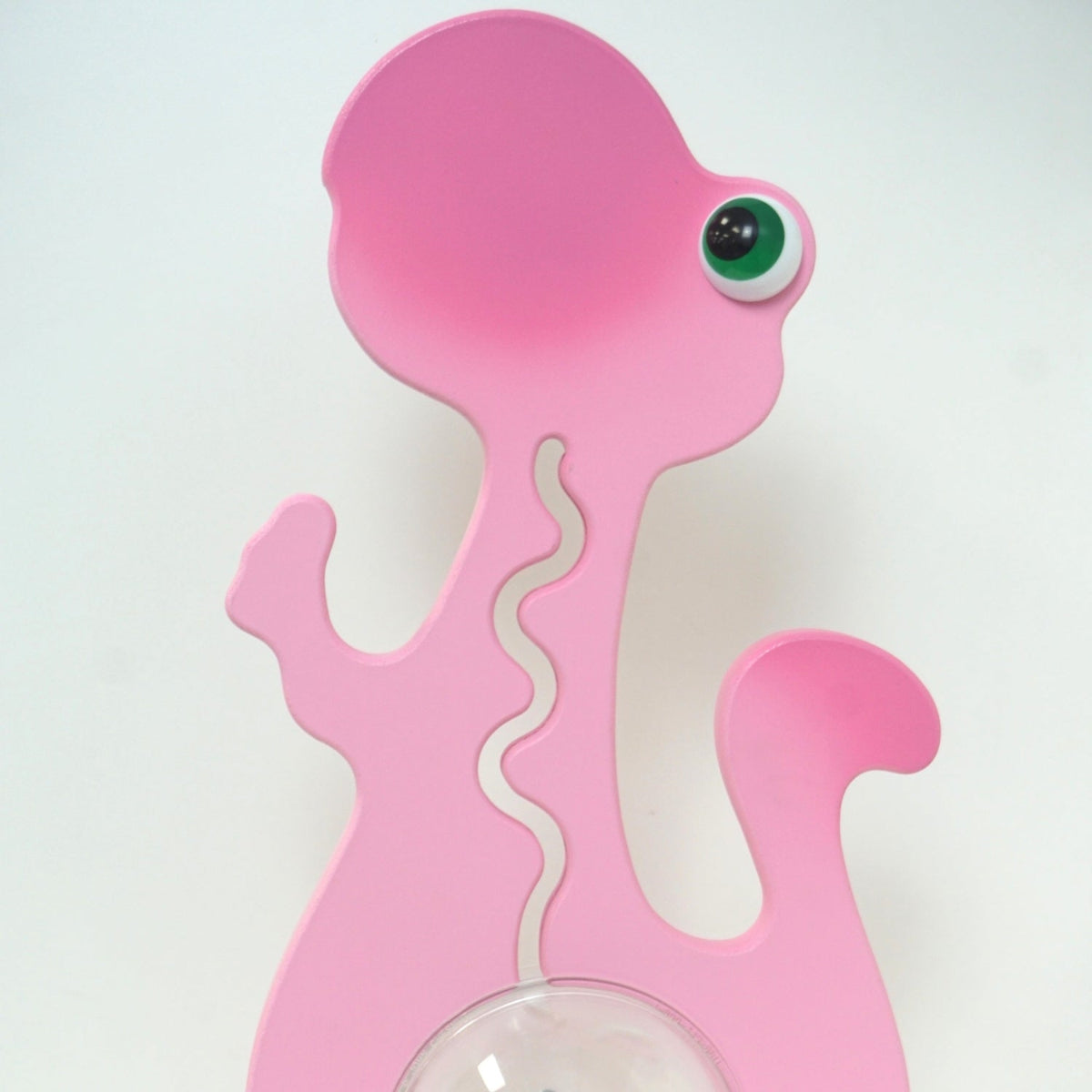 Pink dinosaur bank back view closeup