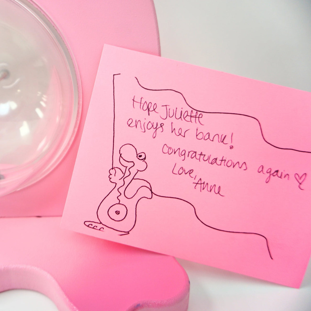 Pink Dinosaur Bank Foot With Note