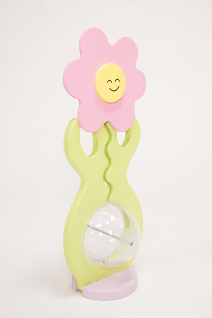 Flower shaped coin bank side view