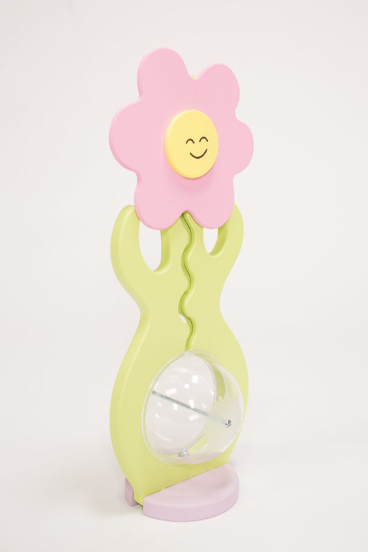 Flower shaped coin bank side view