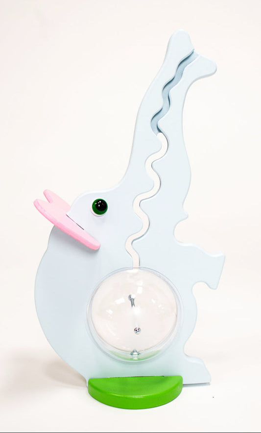 A 20 inch tall white elephant-shaped piggy bank with a pink and green base.